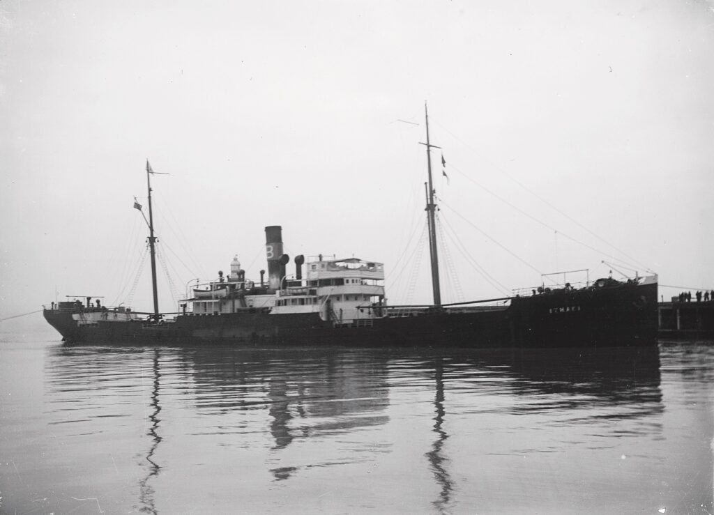 Photograph of the steamship ITHAKI, built in 1899 as INCHKEITH — under the Greek flag since 1908, owned by P.D. Barounos, Ithaki.